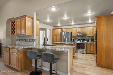 Tucked away on a quiet and prestigious cul-de-sac in the rolling on LakeRidge Golf Course in Nevada - for sale on GolfHomes.com, golf home, golf lot