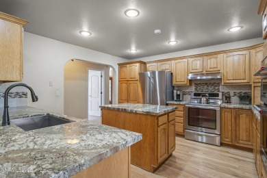 Tucked away on a quiet and prestigious cul-de-sac in the rolling on LakeRidge Golf Course in Nevada - for sale on GolfHomes.com, golf home, golf lot