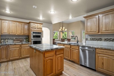 Tucked away on a quiet and prestigious cul-de-sac in the rolling on LakeRidge Golf Course in Nevada - for sale on GolfHomes.com, golf home, golf lot
