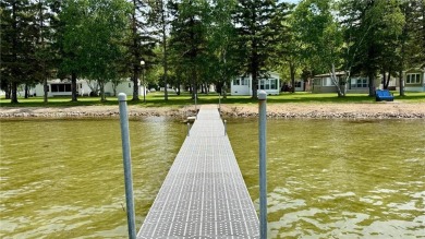 Enjoy beautiful Fish Hook Lake without the work! Well maintained on Headwaters Country Club in Minnesota - for sale on GolfHomes.com, golf home, golf lot