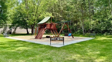 Enjoy beautiful Fish Hook Lake without the work! Well maintained on Headwaters Country Club in Minnesota - for sale on GolfHomes.com, golf home, golf lot