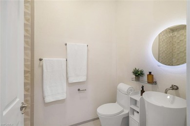 Click video link for more up-close details. Move-in ready luxury on Miromar Lakes Golf Club in Florida - for sale on GolfHomes.com, golf home, golf lot