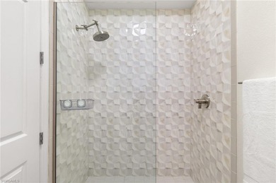 Click video link for more up-close details. Move-in ready luxury on Miromar Lakes Golf Club in Florida - for sale on GolfHomes.com, golf home, golf lot