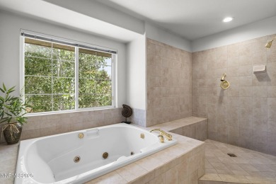 Tucked away on a quiet and prestigious cul-de-sac in the rolling on LakeRidge Golf Course in Nevada - for sale on GolfHomes.com, golf home, golf lot