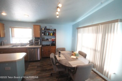 VIEWS VIEWS VIEWS Well maintained home with unobstructed views on Star Valley RV Golf Course in Wyoming - for sale on GolfHomes.com, golf home, golf lot
