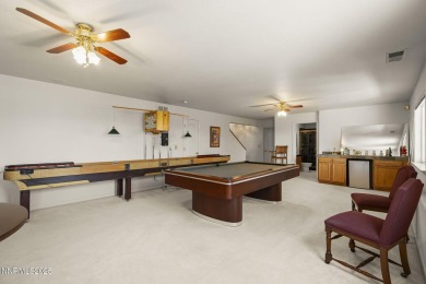 Tucked away on a quiet and prestigious cul-de-sac in the rolling on LakeRidge Golf Course in Nevada - for sale on GolfHomes.com, golf home, golf lot