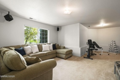 Tucked away on a quiet and prestigious cul-de-sac in the rolling on LakeRidge Golf Course in Nevada - for sale on GolfHomes.com, golf home, golf lot