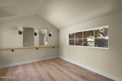 Tucked away on a quiet and prestigious cul-de-sac in the rolling on LakeRidge Golf Course in Nevada - for sale on GolfHomes.com, golf home, golf lot