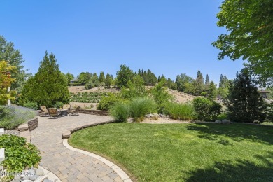 Tucked away on a quiet and prestigious cul-de-sac in the rolling on LakeRidge Golf Course in Nevada - for sale on GolfHomes.com, golf home, golf lot