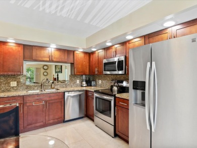 Impeccably maintained 2 bedroom / 2 bathroom, 1200+ Sq Ft unit on Flamingo Lakes Country Club in Florida - for sale on GolfHomes.com, golf home, golf lot