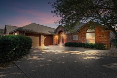 What a view!  This beautiful home looks over the 7th fairway of on Whitestone Golf Club in Texas - for sale on GolfHomes.com, golf home, golf lot