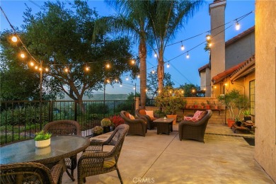 A wonderful home nestled high in the hills of Anaheim surrounded on Anaheim Hills Golf Course in California - for sale on GolfHomes.com, golf home, golf lot