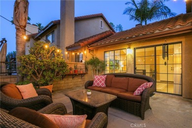 A wonderful home nestled high in the hills of Anaheim surrounded on Anaheim Hills Golf Course in California - for sale on GolfHomes.com, golf home, golf lot
