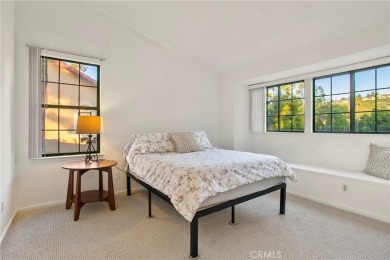 A wonderful home nestled high in the hills of Anaheim surrounded on Anaheim Hills Golf Course in California - for sale on GolfHomes.com, golf home, golf lot