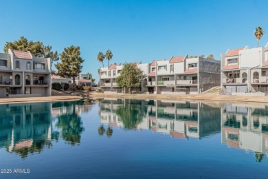 Stunning tri-level, gated waterfront townhome in Dobson Ranch's on Dobson Ranch Municipal Golf Course in Arizona - for sale on GolfHomes.com, golf home, golf lot