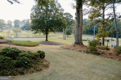 Step inside this one-of-a-kind mid-century home overlooking on Newnan Country Club in Georgia - for sale on GolfHomes.com, golf home, golf lot