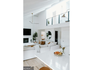 Step inside this one-of-a-kind mid-century home overlooking on Newnan Country Club in Georgia - for sale on GolfHomes.com, golf home, golf lot