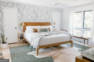 Step inside this one-of-a-kind mid-century home overlooking on Newnan Country Club in Georgia - for sale on GolfHomes.com, golf home, golf lot