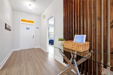 This exceptional ChampionsGate Retreat POOL home showcases on The Oasis Club at Champions Gate in Florida - for sale on GolfHomes.com, golf home, golf lot