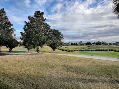 ++GOLF COURSE  WATER VIEW++GOLF CART GARAGE++NEW ROOF++NEW on The Links of Spruce Creek in Florida - for sale on GolfHomes.com, golf home, golf lot