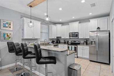 Short walk to The Oasis Club, this beautifully updated vacation on The Oasis Club at Champions Gate in Florida - for sale on GolfHomes.com, golf home, golf lot