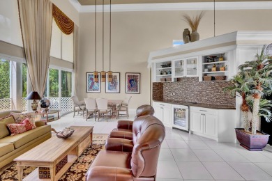 Golf course vistas fill this elegant custom 2-story 6 BD/5 BA on Woodfield Country Club in Florida - for sale on GolfHomes.com, golf home, golf lot