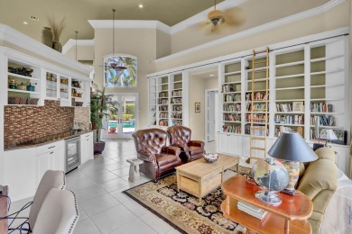 Golf course vistas fill this elegant custom 2-story 6 BD/5 BA on Woodfield Country Club in Florida - for sale on GolfHomes.com, golf home, golf lot