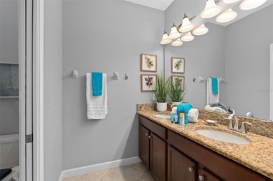 Short walk to The Oasis Club, this beautifully updated vacation on The Oasis Club at Champions Gate in Florida - for sale on GolfHomes.com, golf home, golf lot