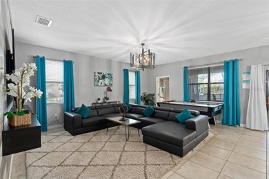 Short walk to The Oasis Club, this beautifully updated vacation on The Oasis Club at Champions Gate in Florida - for sale on GolfHomes.com, golf home, golf lot