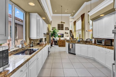 Golf course vistas fill this elegant custom 2-story 6 BD/5 BA on Woodfield Country Club in Florida - for sale on GolfHomes.com, golf home, golf lot