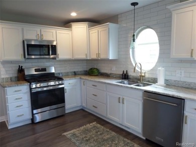 Sought after Waterstone Sub. 15 lakes and golf course community on Boulder Pointe Golf Club and Conference Center in Michigan - for sale on GolfHomes.com, golf home, golf lot