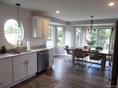 Sought after Waterstone Sub. 15 lakes and golf course community on Boulder Pointe Golf Club and Conference Center in Michigan - for sale on GolfHomes.com, golf home, golf lot