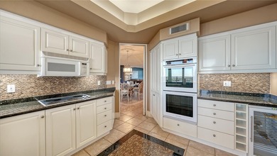 Fully furnished Gulf-to-bay residence perched on the 9th floor on Links on Longboat Golf Club in Florida - for sale on GolfHomes.com, golf home, golf lot