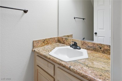 Set within Painted Desert, a guard-gated golf course community on Painted Desert Golf Club in Nevada - for sale on GolfHomes.com, golf home, golf lot