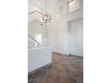 Set within Painted Desert, a guard-gated golf course community on Painted Desert Golf Club in Nevada - for sale on GolfHomes.com, golf home, golf lot