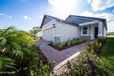 WATERFRONT HOME - PRICED TO SELL! Stunning, energy-efficient on LPGA International Golf Course in Florida - for sale on GolfHomes.com, golf home, golf lot