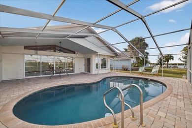 Waterfront living with Gulf access in the heart of Gulf Harbors on Gulf Harbors Golf Course in Florida - for sale on GolfHomes.com, golf home, golf lot