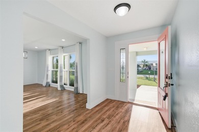 Exquisite Waterfront Oasis - Discover coastal luxury at its on Palm Harbor Golf Club in Florida - for sale on GolfHomes.com, golf home, golf lot