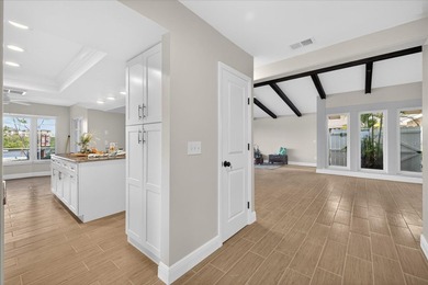 Waterfront living with Gulf access in the heart of Gulf Harbors on Gulf Harbors Golf Course in Florida - for sale on GolfHomes.com, golf home, golf lot