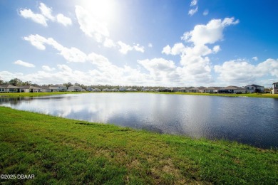 WATERFRONT HOME - PRICED TO SELL! Stunning, energy-efficient on LPGA International Golf Course in Florida - for sale on GolfHomes.com, golf home, golf lot