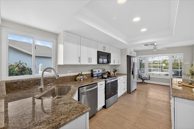 Waterfront living with Gulf access in the heart of Gulf Harbors on Gulf Harbors Golf Course in Florida - for sale on GolfHomes.com, golf home, golf lot