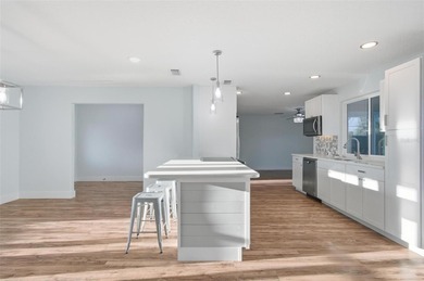 Exquisite Waterfront Oasis - Discover coastal luxury at its on Palm Harbor Golf Club in Florida - for sale on GolfHomes.com, golf home, golf lot