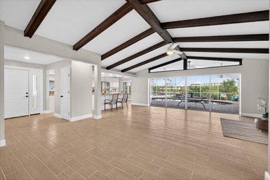 Waterfront living with Gulf access in the heart of Gulf Harbors on Gulf Harbors Golf Course in Florida - for sale on GolfHomes.com, golf home, golf lot