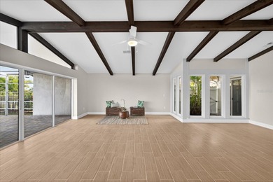 Waterfront living with Gulf access in the heart of Gulf Harbors on Gulf Harbors Golf Course in Florida - for sale on GolfHomes.com, golf home, golf lot