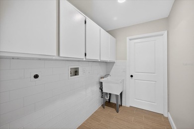 Waterfront living with Gulf access in the heart of Gulf Harbors on Gulf Harbors Golf Course in Florida - for sale on GolfHomes.com, golf home, golf lot