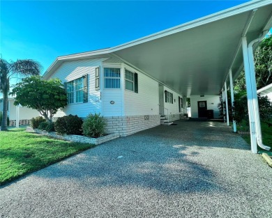 HUGE PRICE REDUCTION ON THIS 2001 BUILT JACOBSEN HOME!!!! Seize on Fairway Village Golf Course in Florida - for sale on GolfHomes.com, golf home, golf lot