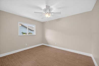 Waterfront living with Gulf access in the heart of Gulf Harbors on Gulf Harbors Golf Course in Florida - for sale on GolfHomes.com, golf home, golf lot