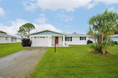 Experience Florida living at its finest in this beautifully on Jacaranda West Country Club in Florida - for sale on GolfHomes.com, golf home, golf lot