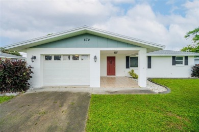 Experience Florida living at its finest in this beautifully on Jacaranda West Country Club in Florida - for sale on GolfHomes.com, golf home, golf lot