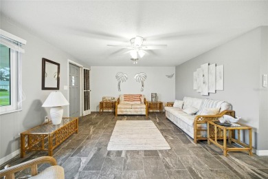 Experience Florida living at its finest in this beautifully on Jacaranda West Country Club in Florida - for sale on GolfHomes.com, golf home, golf lot